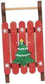 a wooden sler with a christmas tree on it.jpg